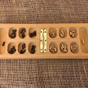 Vintage wood Mancala travel game.